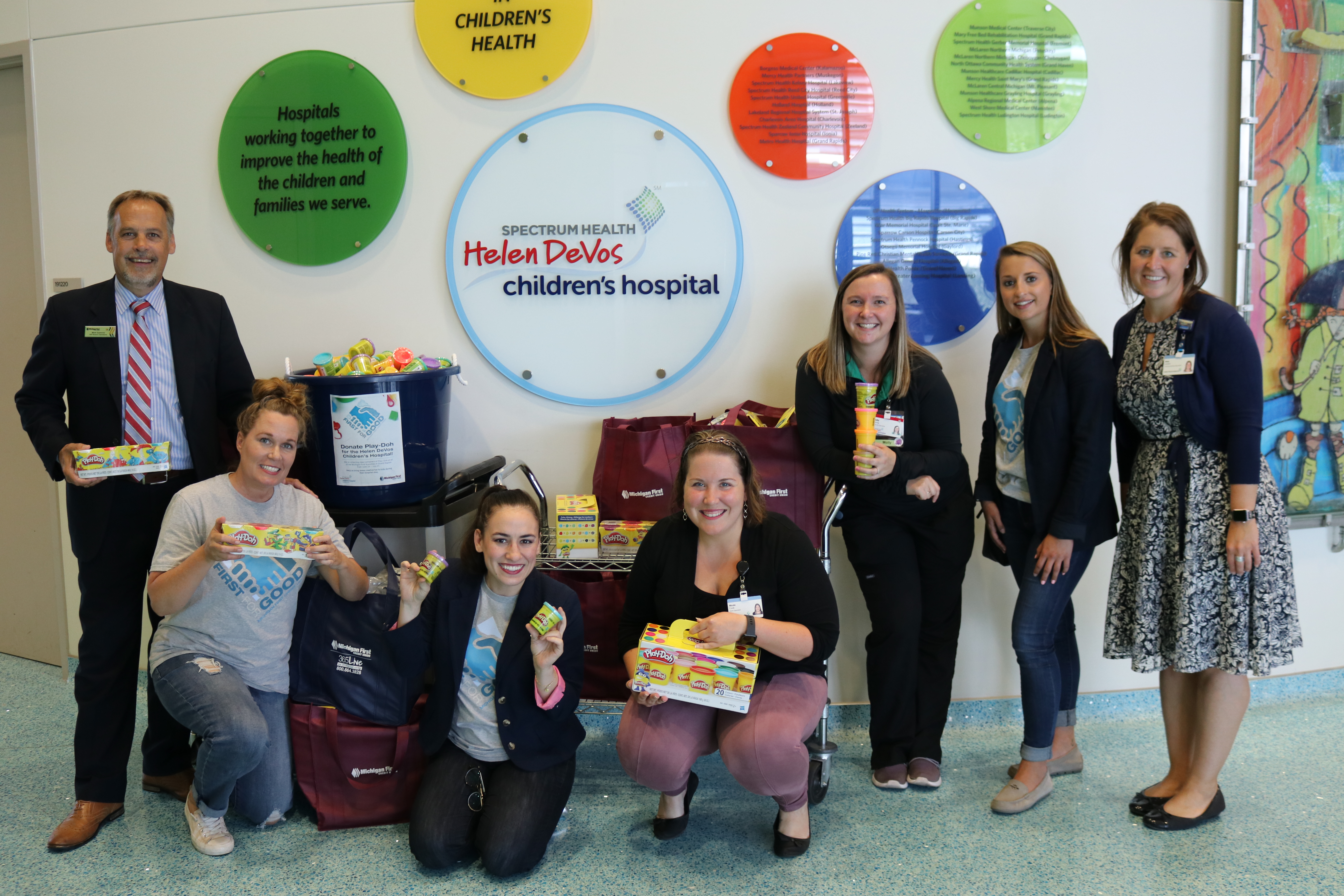 Donating the collection from our Play-Doh Drive to the Helen DeVos Children's Hospital.